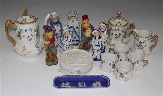 A Limoges part coffee service, four bisque plaques, a Wedgwood pin tray and seven Continental porcelain figures